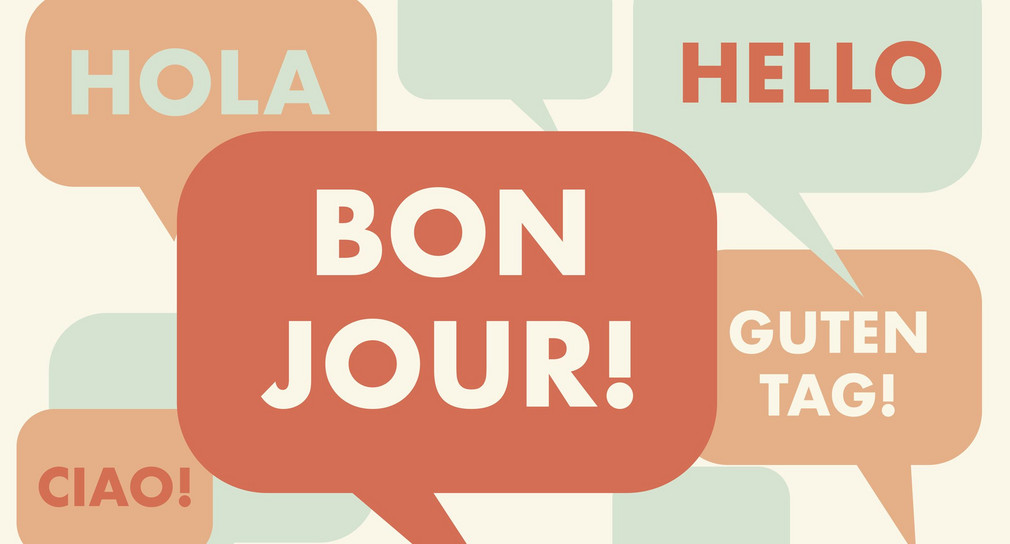 Eine Grafik zeigt mehrere bunte Sprechblasen auf denen jeweils steht: Bon Jour, Hola, Hello, Ciao und Guten Tag.