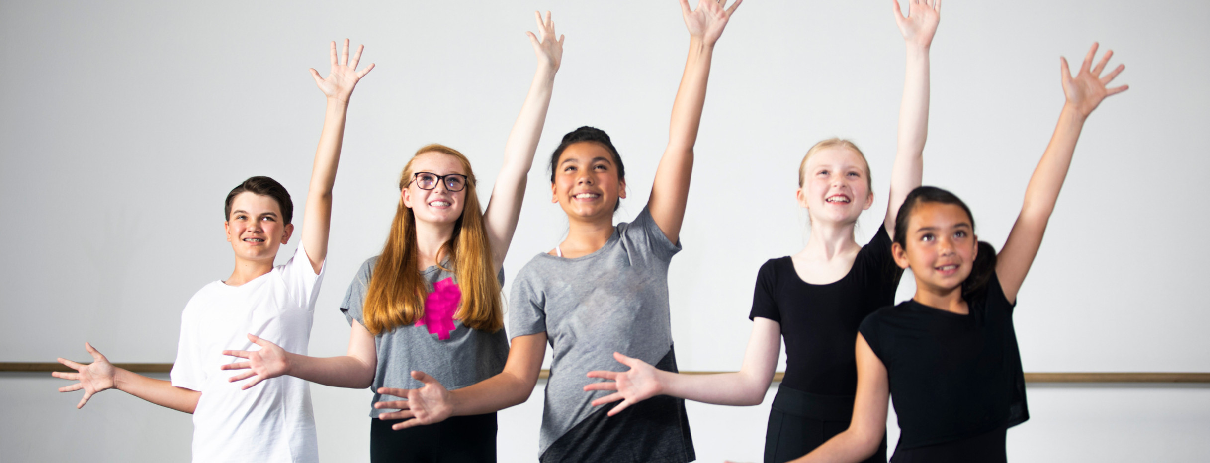 Diverse Young Students Practicing Musical Theatre Dance in Studio