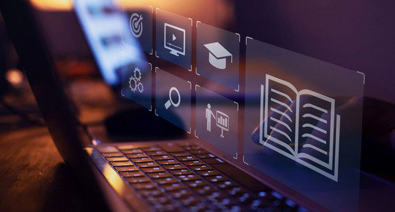 eine Grafik mit Symbolen, die Digitalisierung in der Schule zeigen